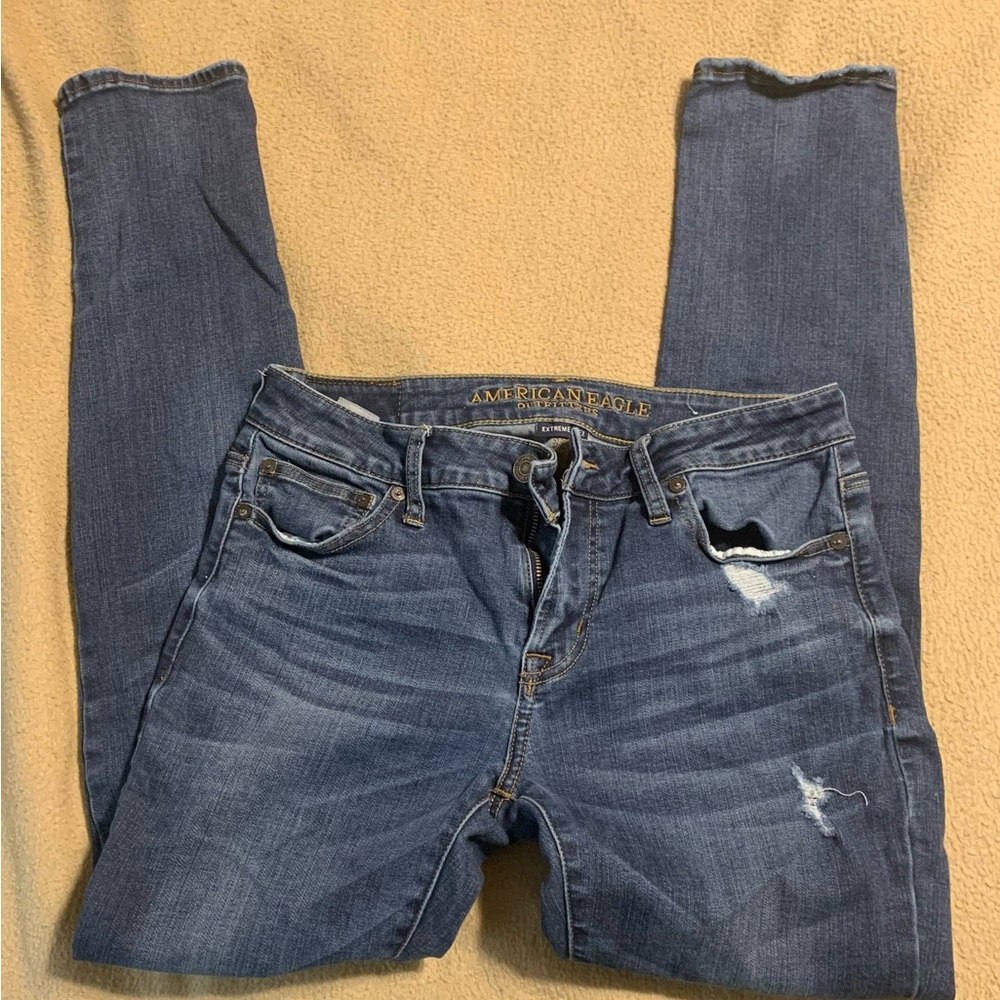 Mens American Eagle jeans size 30/32. Shown as is when purchased brand new.